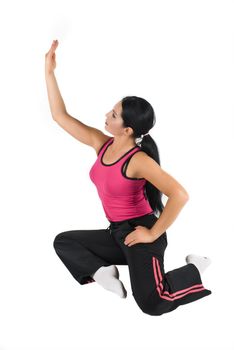 Woman doing some exercises yoga style on white background