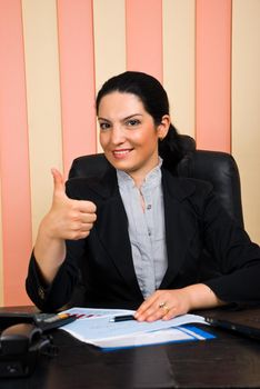 Business woman giving thumbs