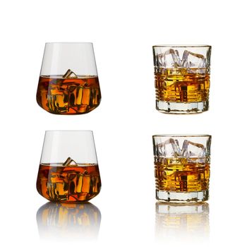 set of whiskey glasses. Collage glasses of whiskey on white background.