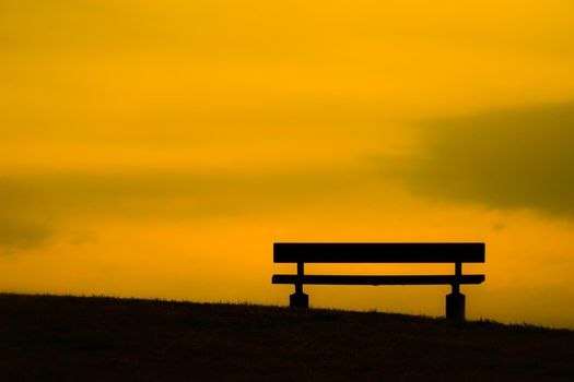 Hill bench at dusk