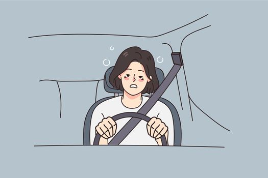 Exhausted woman driving car feeling unwell