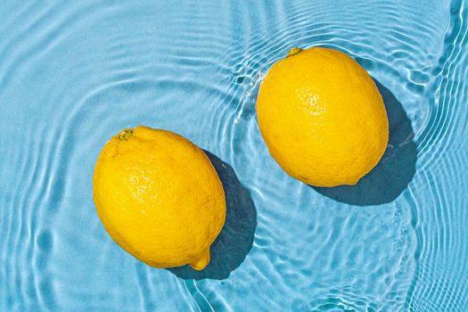 Lemon fresh citrus food vitamin c water wave motion. Minimal trend exotic and summer concept.