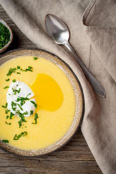 Polenta, porridge with Parmesan cheese and poached egg,