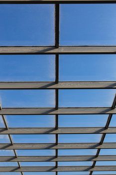 Glass canopy on a metal frame 