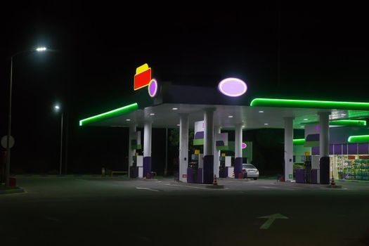 gas station at night in the city