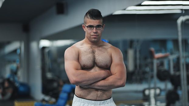 Muscular Arab in the gym after a workout.