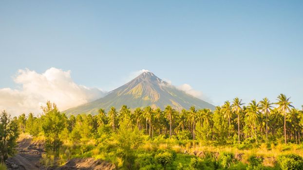 Mayon Volcano in Legazpi, Philippines. Mayon Volcano is an active volcano and rising 2462 meters from the shores of the Gulf of Albay.