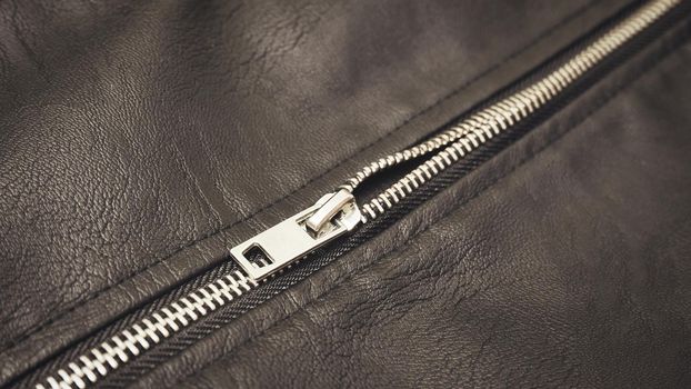 Chrome metal zipper on a leather jacket
