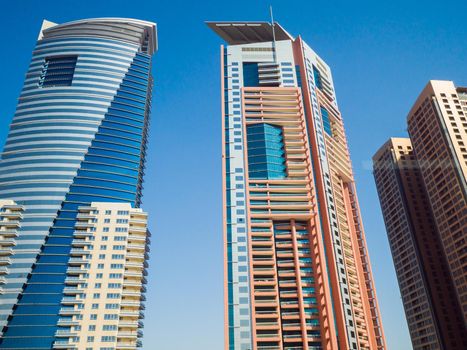 High-rise skyscrapers with blue sky of Dubai city. UAE.