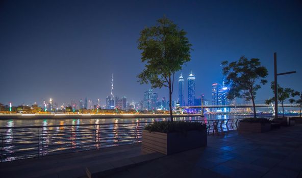 Panorama of skyscrapers of Dubai at night. View of Dubai Greek district.