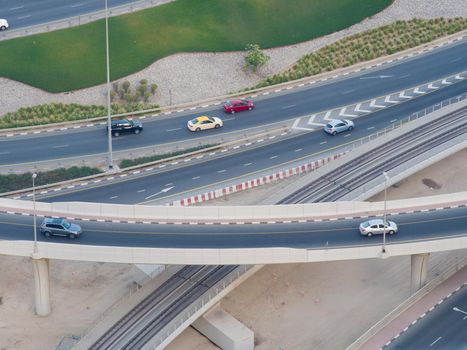 Part of a road junction from a height with road traffic in Dubai.