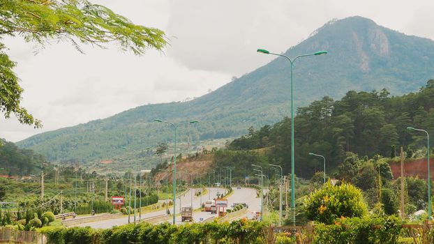 The highway with traffic on the way to the city of Dalat. Vietnam.