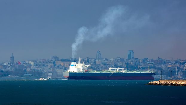 Large tanker sails through the Bosphorus. Istanbul international sailing.