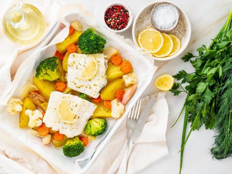 Fish cod baked in the oven with vegetables - healthy diet healthy food. Light