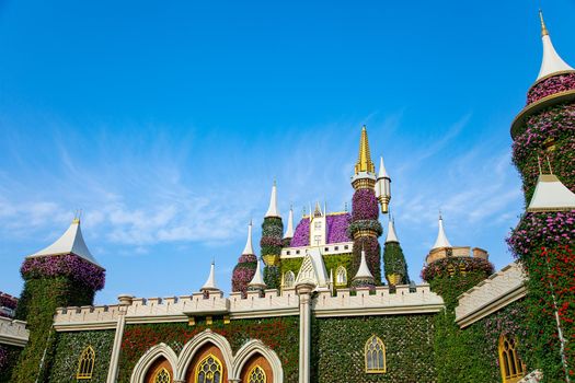 Floral magic fairy green castle and blue sky