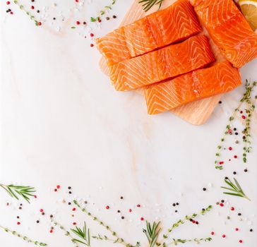 Food background, salmon steaks and seasonings