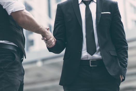Businessmen making handshake for dealing business project agree concept