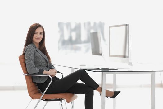 young business woman at workplace in office