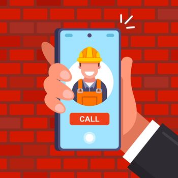 call the builder in a helmet by phone. call the repairman to the house.