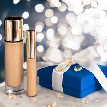 Holiday make-up foundation base, concealer and blue gift box, luxury cosmetics present and blank label products for beauty brand design