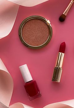 Beauty, make-up and cosmetics flatlay design with copyspace, cosmetic products and makeup tools on pink background, girly and feminine style