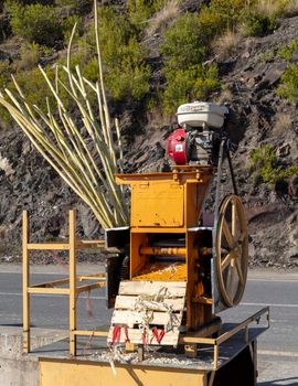Sugarcane juice machine extractor on a roadside
