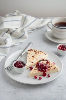 Leipajuusto - traditional Finnish baked cheese - with berries