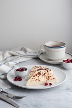 Leipajuusto - traditional Finnish baked cheese - with berries