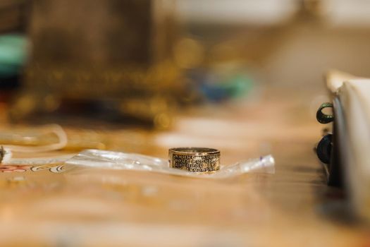 Sacred ring on the table. Orthodox faith. Equipment for praying. Pray for people life. Pray to god.