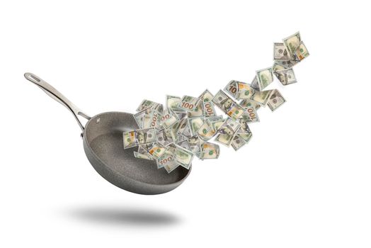 Rising food prices. The concept of rising cost of food. Money in a pot. Dollar bills fly over a frying pan as a symbol of money or salary for food on a white background
