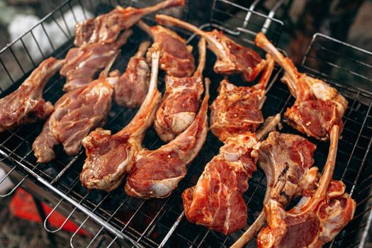 Grilling a rack of lamb on grill barbecue