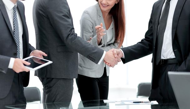 financial Manager and handshake of business partners.
