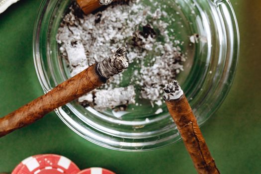 Cigars in an ash tray close up