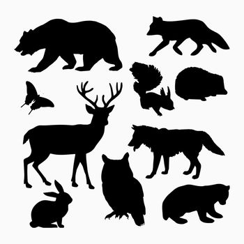 Vector Set of Black Forest Animals and Birds Silhouettes. Hand drawn vector illustration.