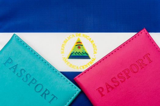 On the background of the flag of Nicaragua is a passport.