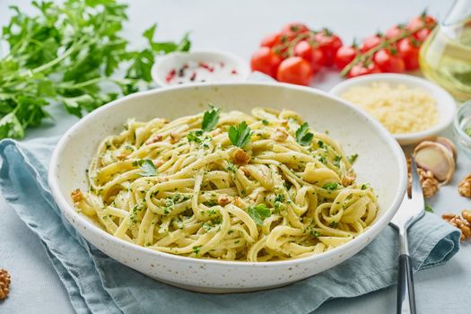 Step by step recipe. Pesto pasta, bavette with walnuts, parsley