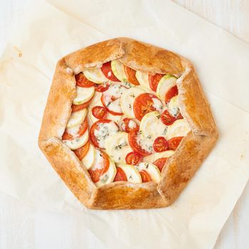 Step by step recipe. Homemade galette with vegetables, wholegrain pie. Top view