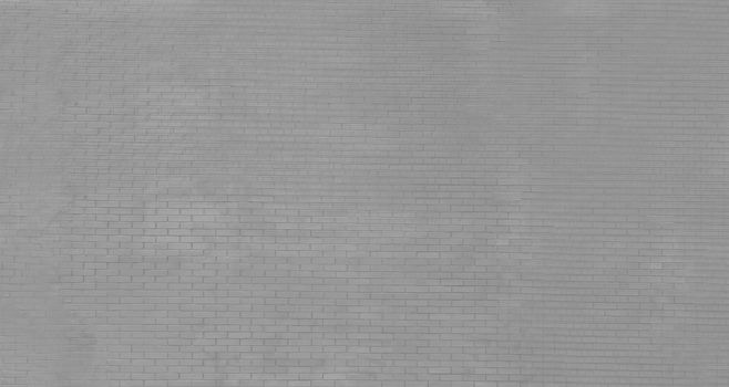 View of an old gray brick wall.