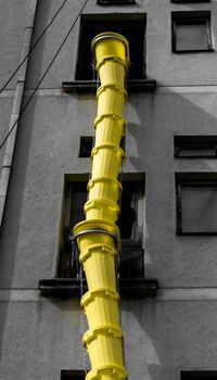 Yellow vertical construction pipe