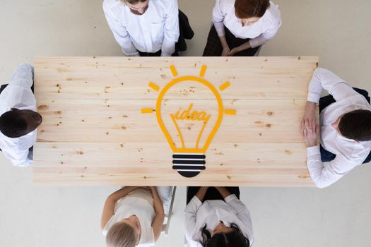 Business team and idea light bulb