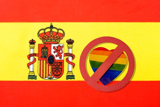 Spain's flag and ban on LGBT people.