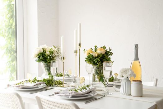 The wedding decor. Wedding table decoration with white roses