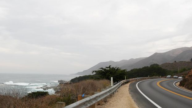 Pacific coast highway 1, Cabrillo road along ocean, foggy California Big Sur USA