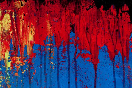 Blue, red and black colored wall texture background.