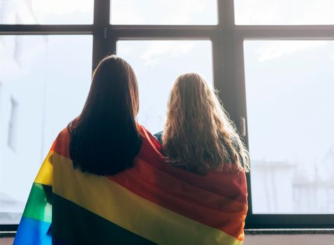 lesbian sweethearts wrapped lgbt flag