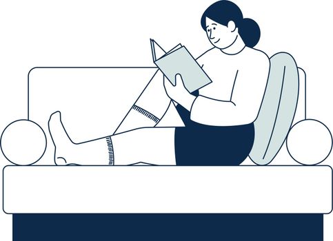 Woman sitting on sofa and reading book. Leisure time