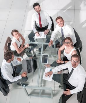 Business People Working Around a Conference Table