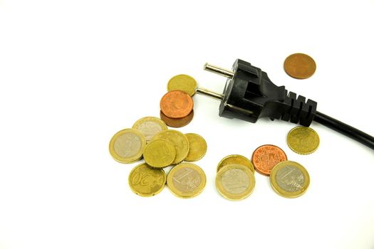 Pin power plug and coins on white background