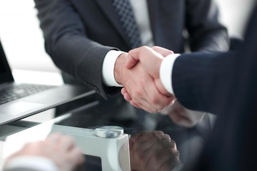 confident handshake of business partners