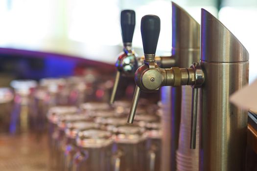 Close up of beer lines for draft beer in restaurant.